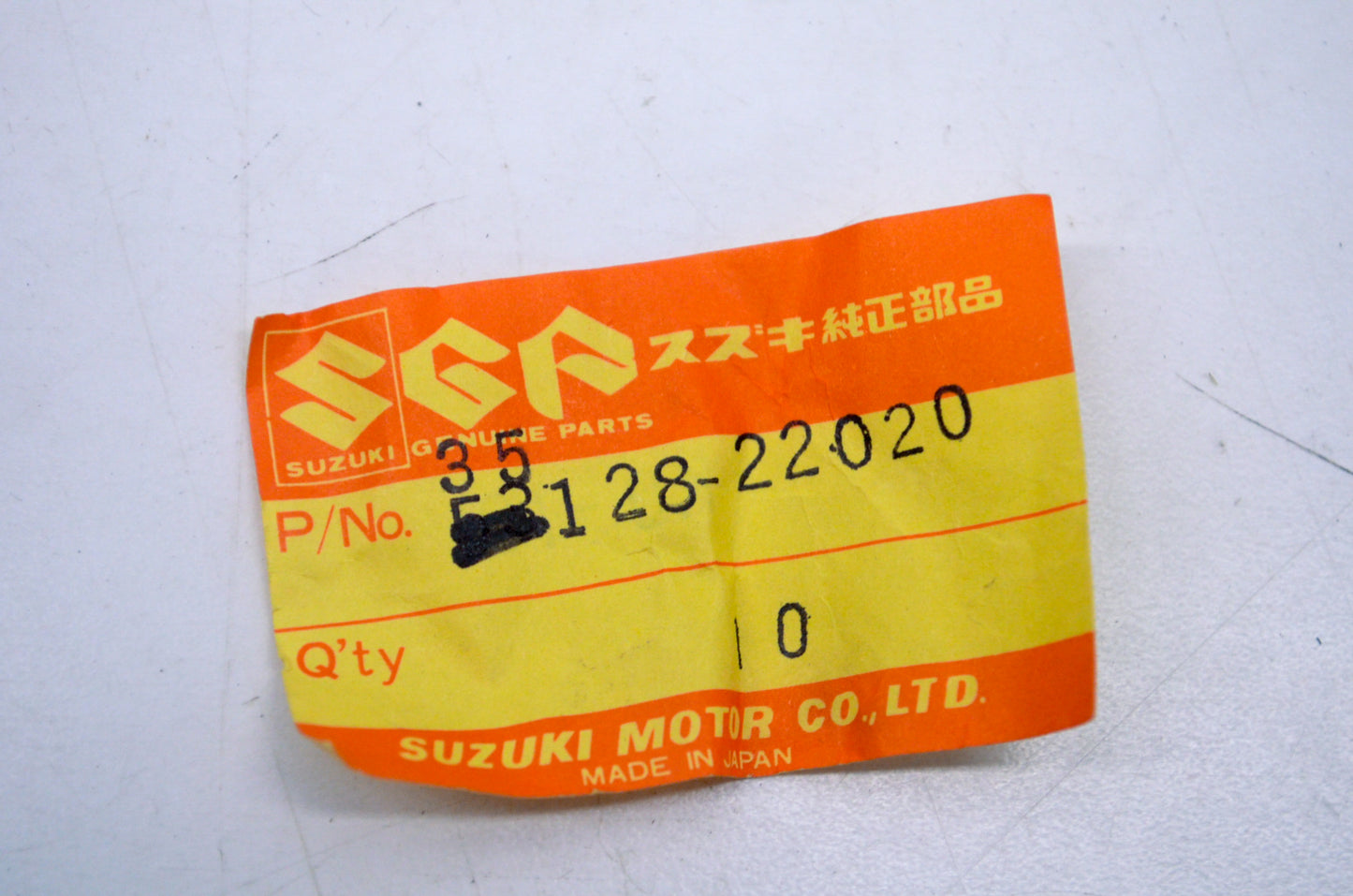 OEM Suzuki 35128-22020 Headlamp Spring NOS