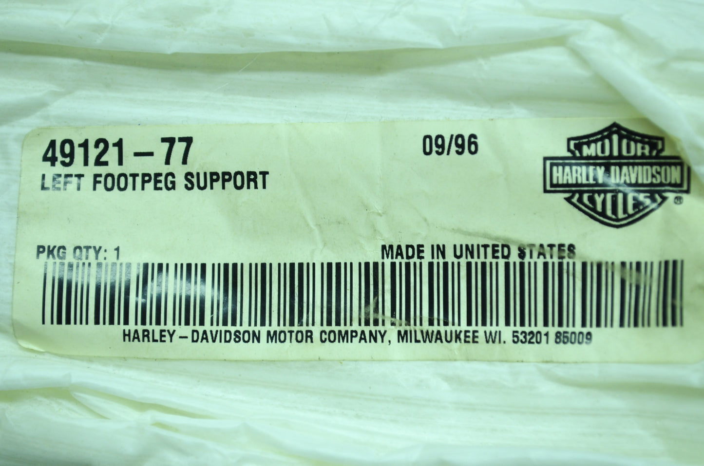 OEM Harley-Davidson 49121-77 Left Footpeg Support NOS