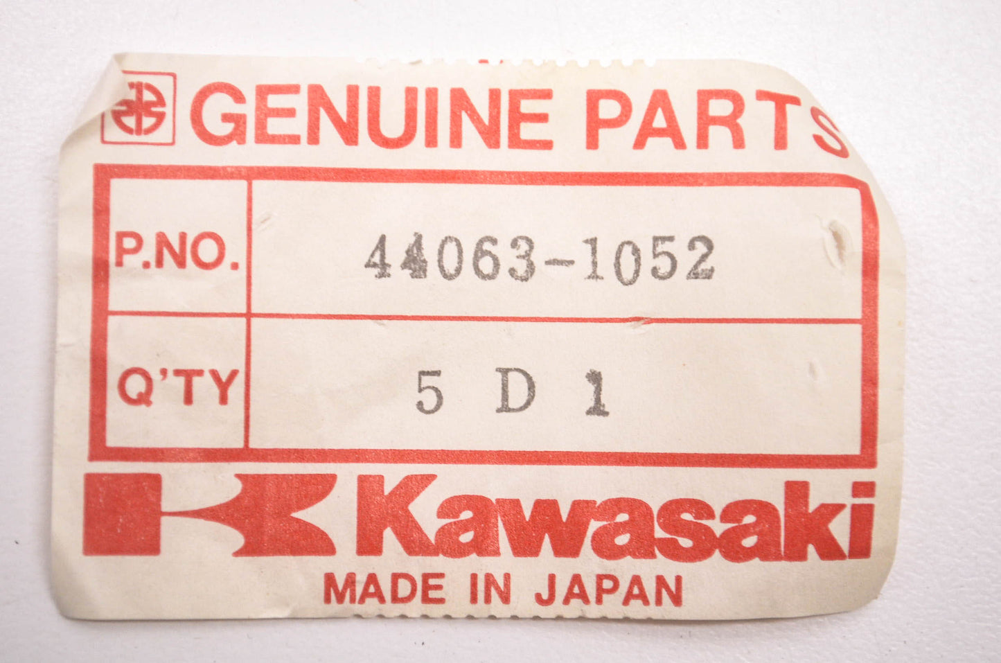 New OEM Kawasaki 44063-1052 Front Axle Holder NOS
