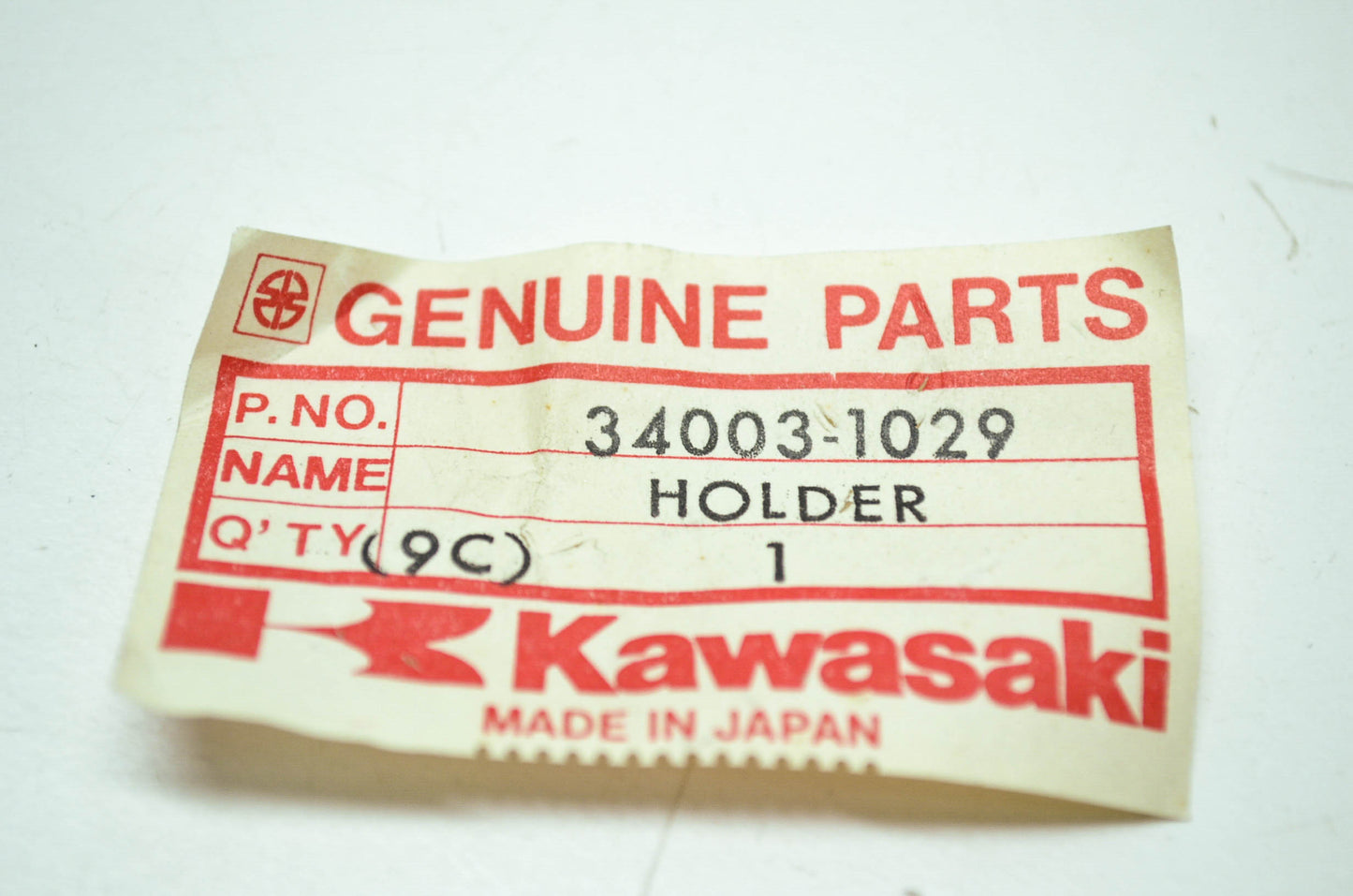 OEM Kawasaki 34003-1029 Left Footrest Holder NOS