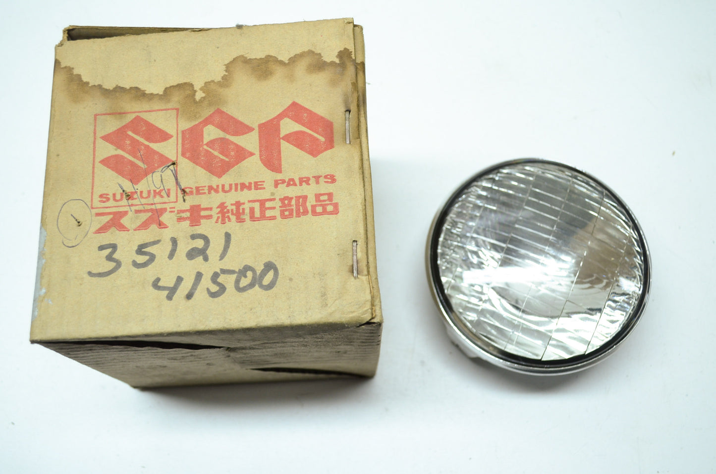 NEW OEM Suzuki Headlight 1984 PE175 35121-41500 NOS