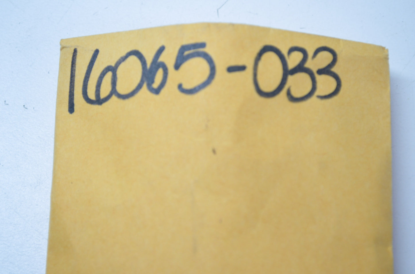 OEM Kawasaki 16065-033 Carburetor Holder NOS