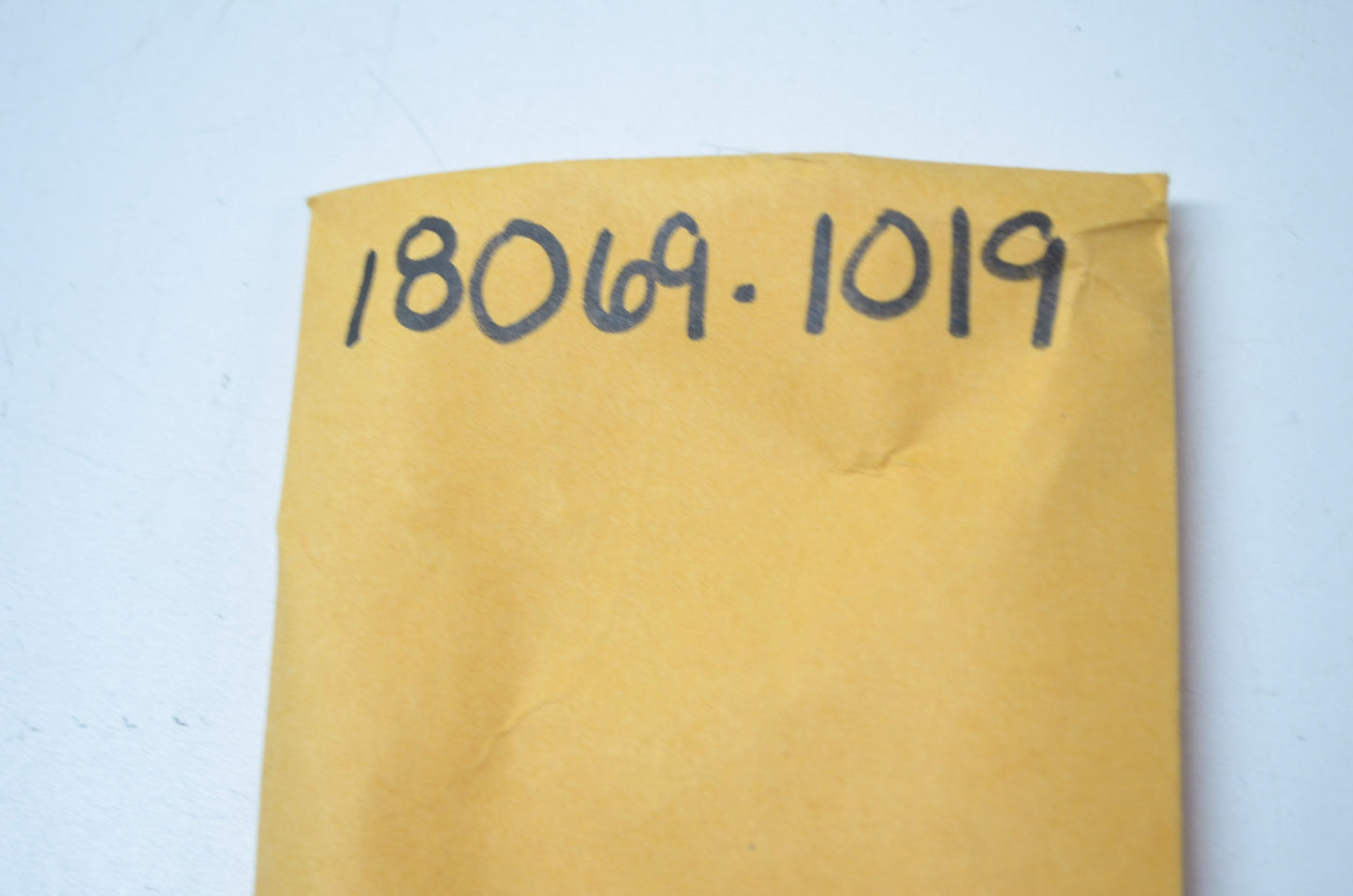 OEM Kawasaki 18069-1019 Exhaust Pipe Holder NOS