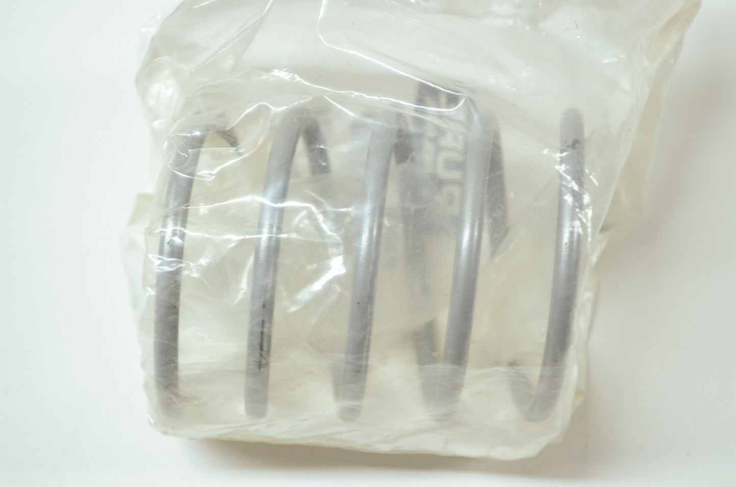 OEM Polaris 7041499 Silver Clutch Spring NOS