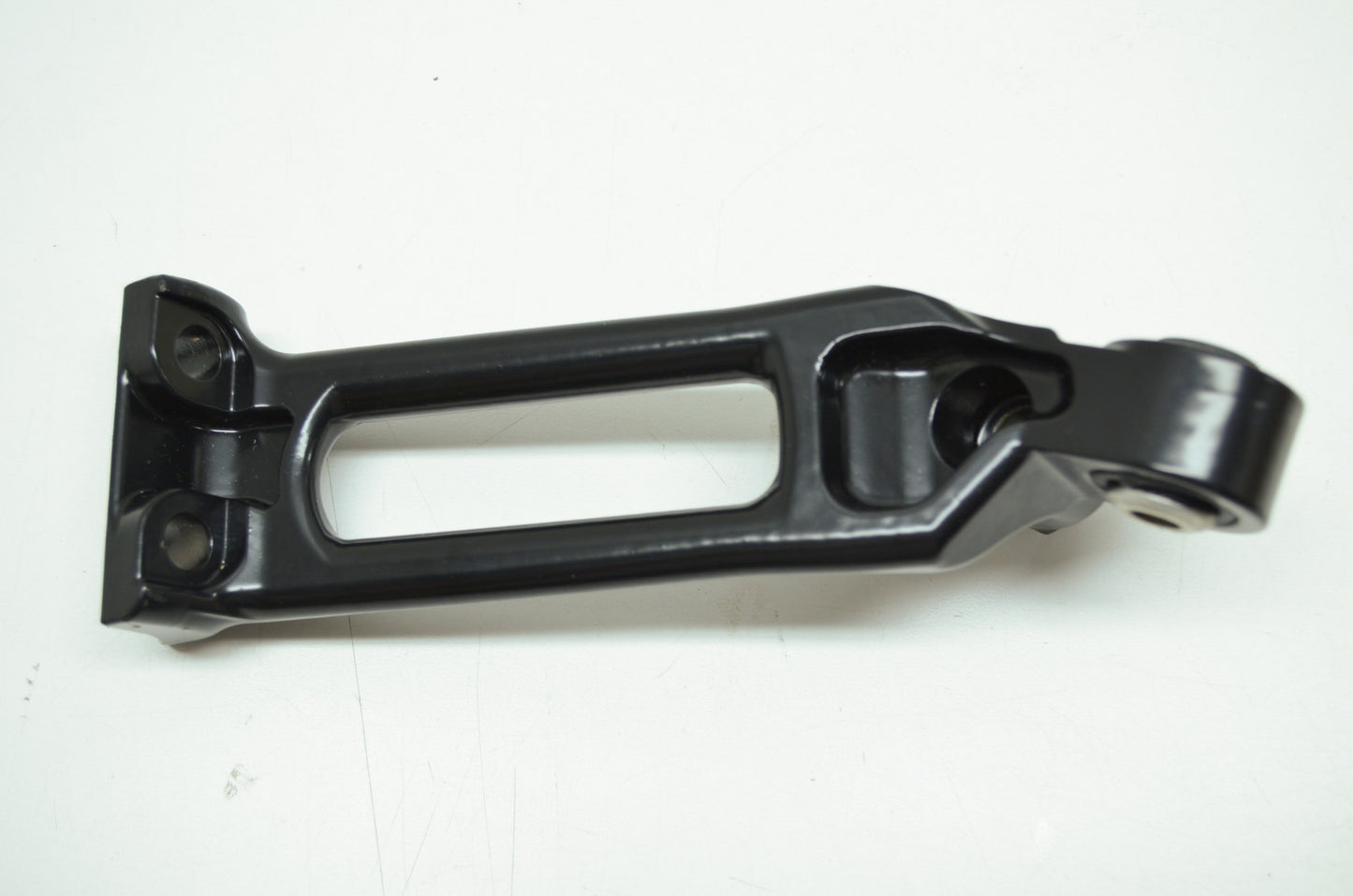 OEM Harley-Davidson 51087-06 Right Passenger Footpeg Support NOS