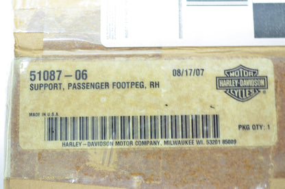 OEM Harley-Davidson 51087-06 Right Passenger Footpeg Support NOS