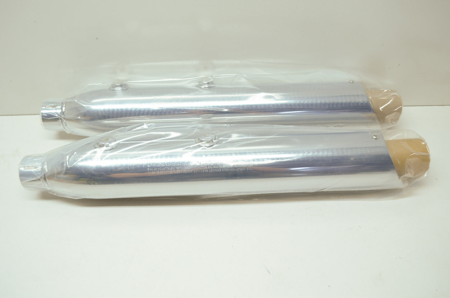 Shorty Dual Slip On Mufflers 07-09 Softail NOS