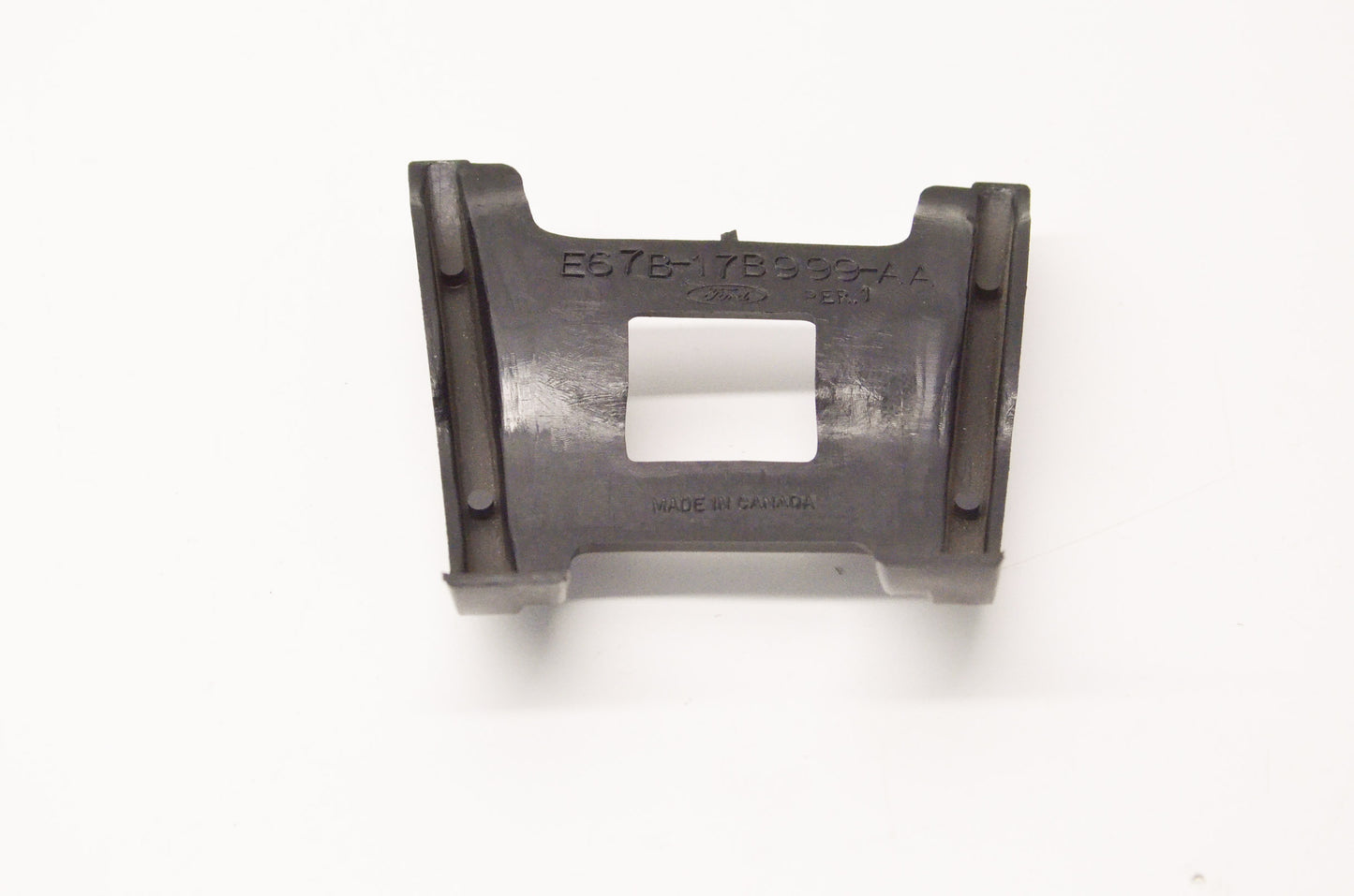 New OEM Ford E67B17B999AA Ford Plastic Bracket NOS