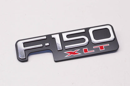 New OEM Ford F65Z16720A F-150 XLT Fender Emblem NOS