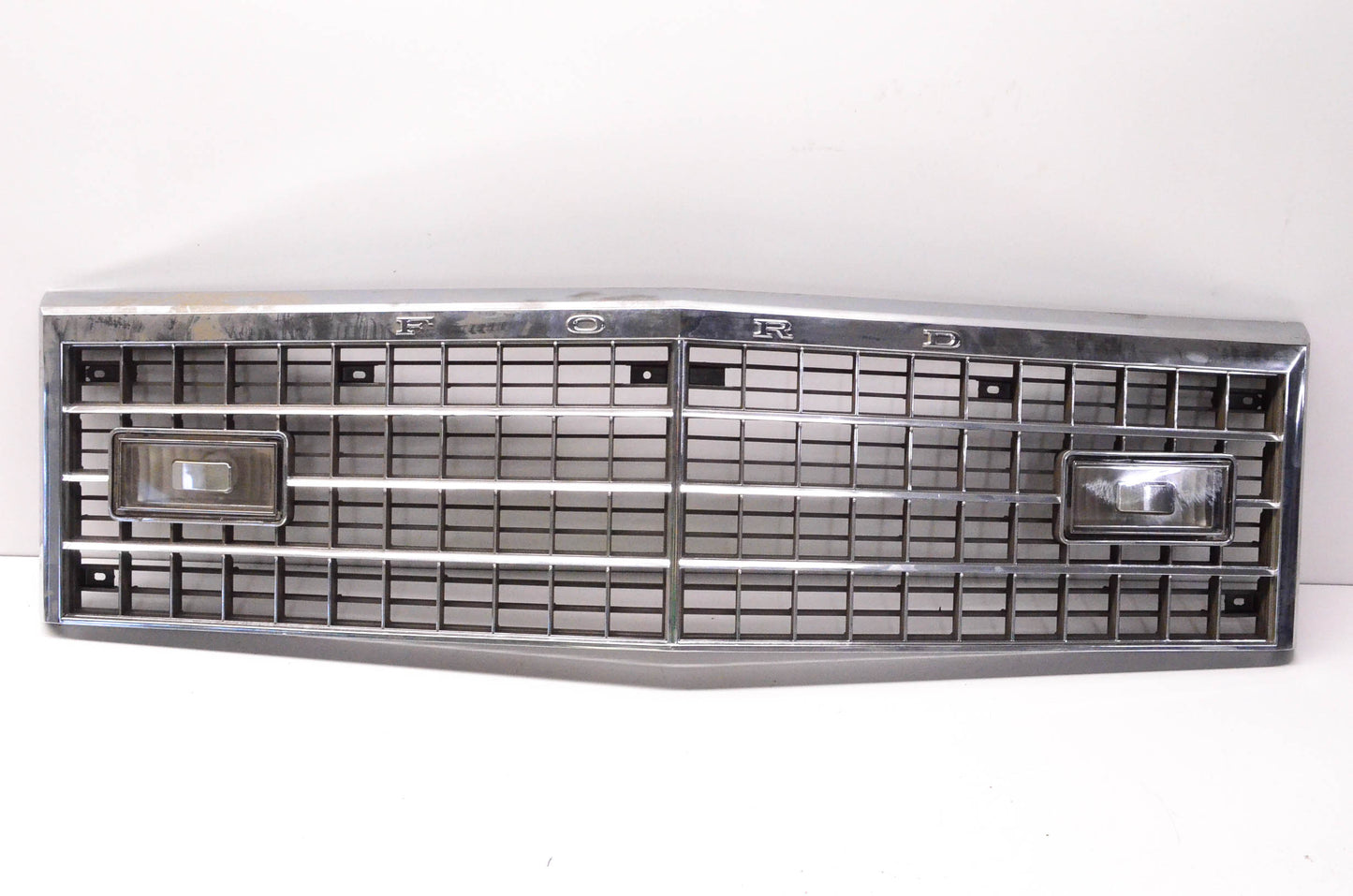 New OEM Ford 1979-1981 Ford Crown Victoria Chrome Grille W/ Parking Lights NOS