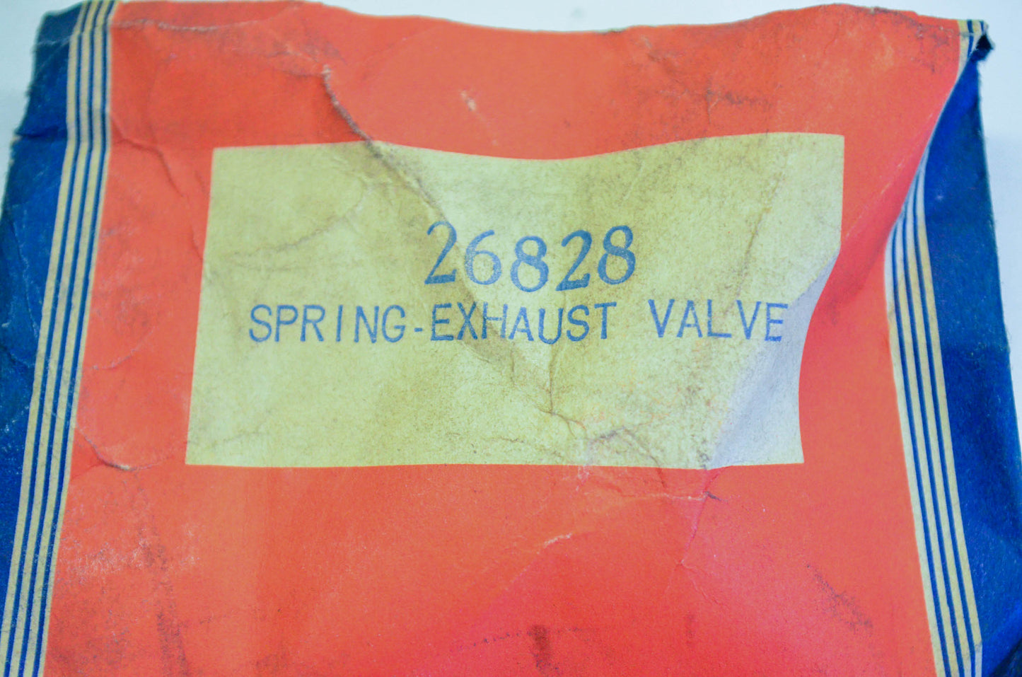 New OEM Briggs & Stratton 26828 Exhaust Valve Spring NOS