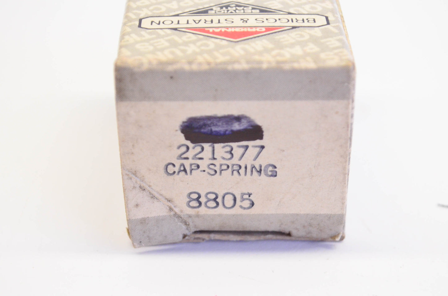 New OEM Briggs & Stratton 21377 Spring Cap NOS