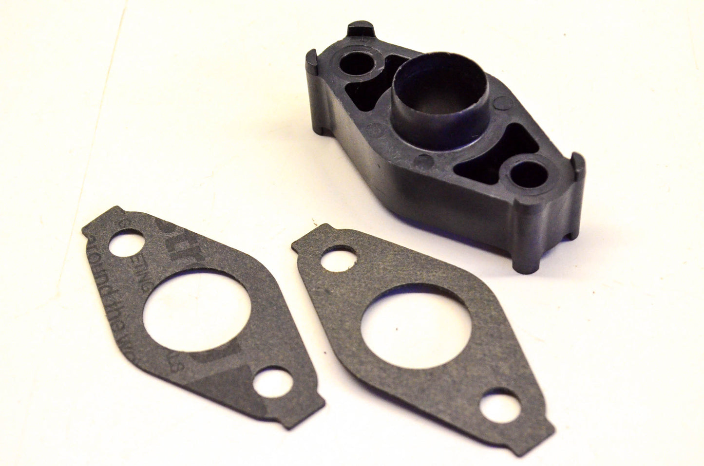 New OEM Briggs & Stratton 693749 Carburetor Spacer NOS