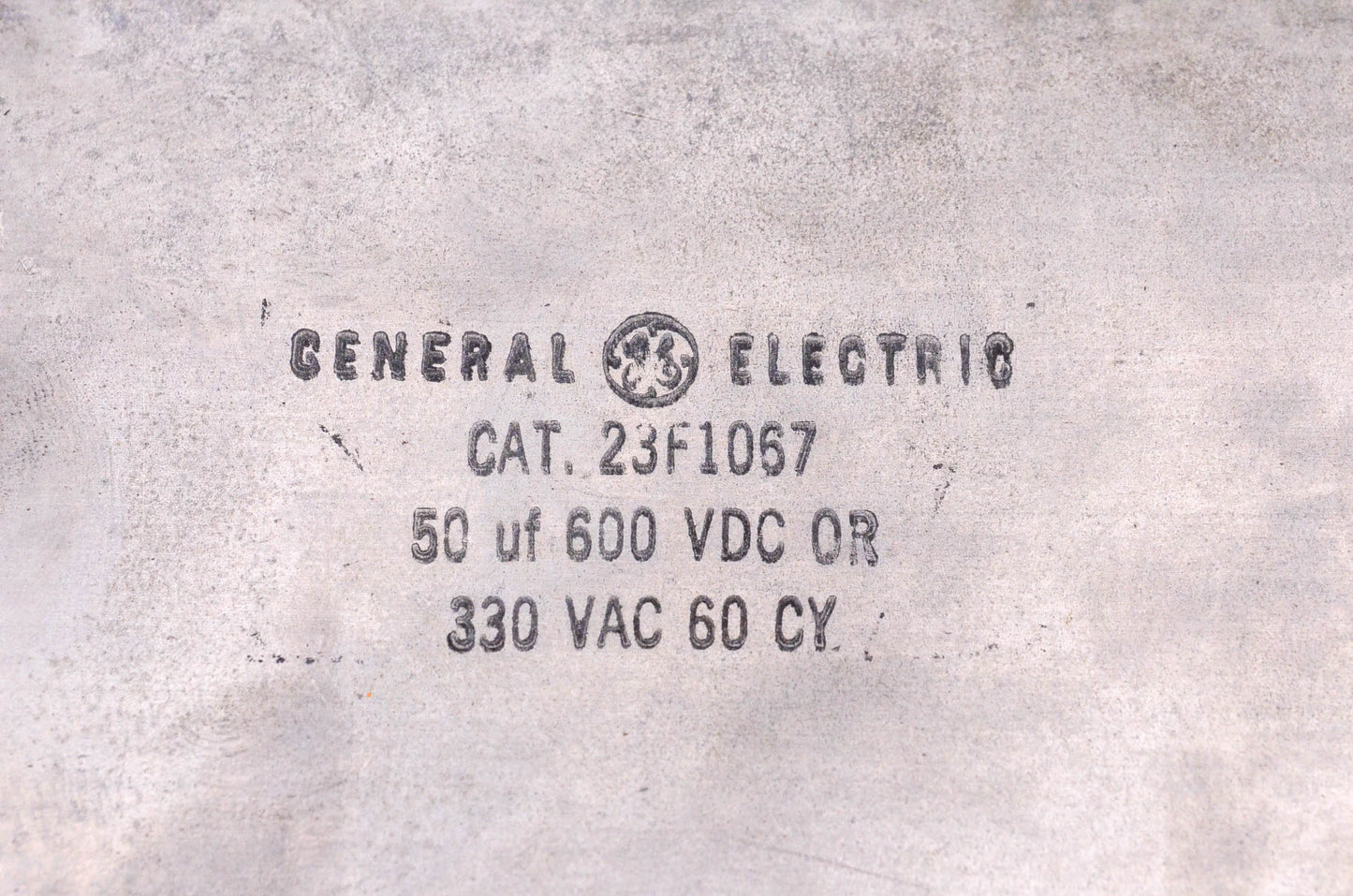 General Electric 23F1067 50uF 600 Volt DC or 300 Volt AC Capacitor