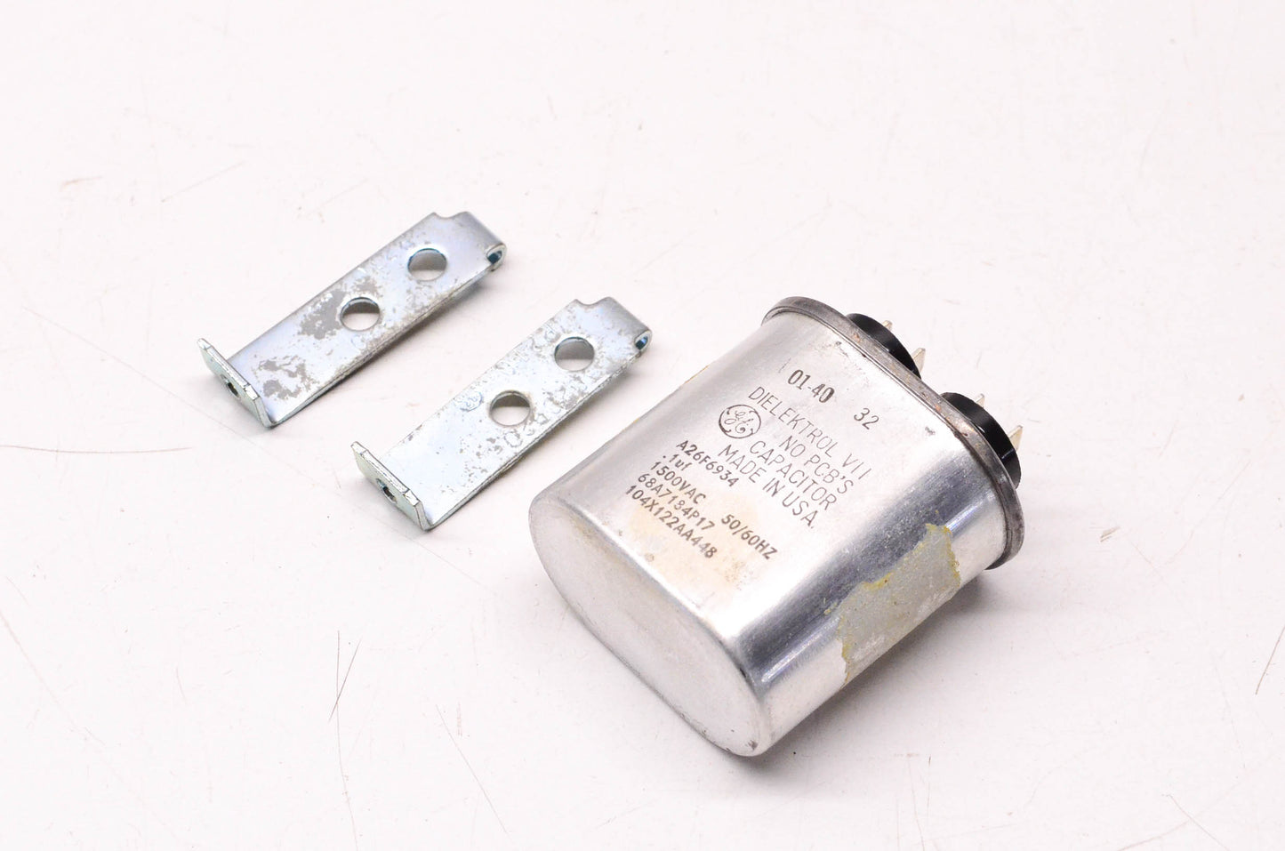 General Electric .1uF 1500 Volt AC 50/60HZ Capacitor W/ Hold Down Clamps NOS