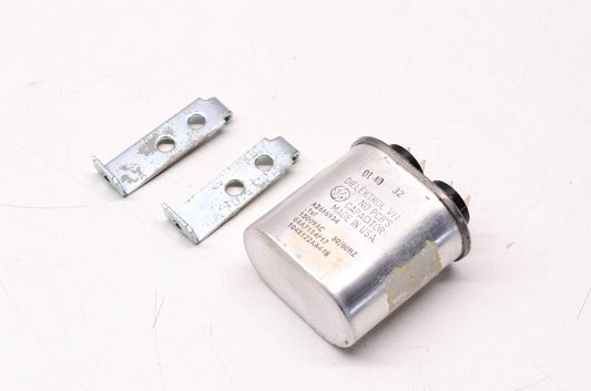 General Electric .1uF 1500 Volt AC 50/60HZ Capacitor W/ Hold Down Clamps NOS