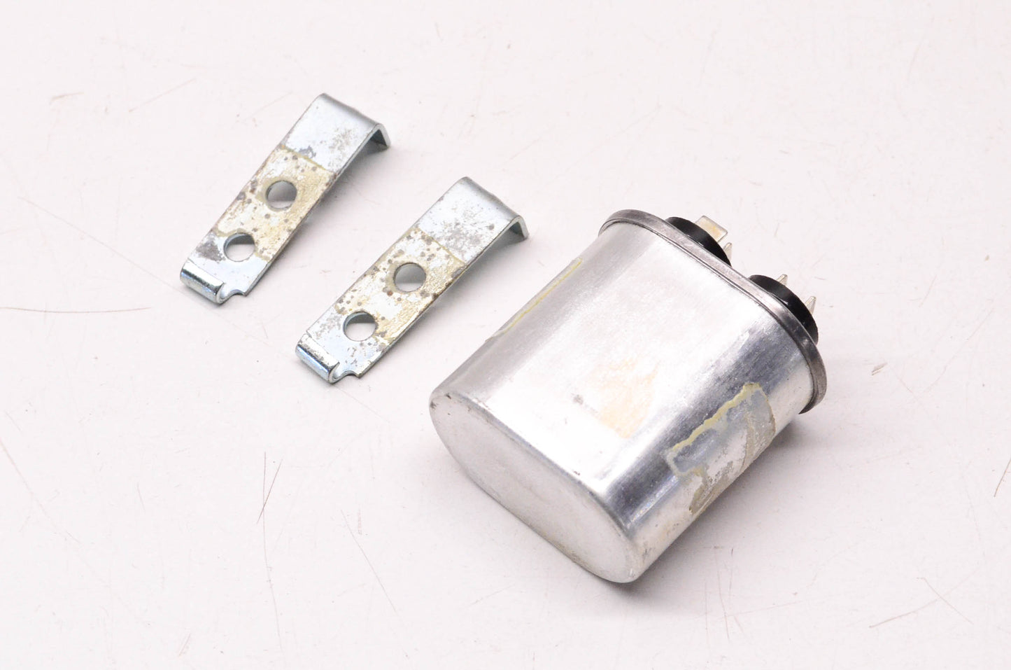 General Electric .1uF 1500 Volt AC 50/60HZ Capacitor W/ Hold Down Clamps NOS