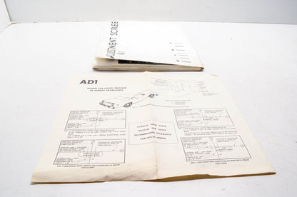 Aftermarket AD1 Manual Headlight Aiming Screen NOS
