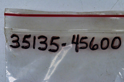 New OEM Suzuki 35135-45600 Head Lamp Nut NOS