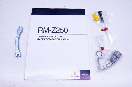 New OEM Suzuki 99011-49H52-03A RM-Z250 Owner's Race Preparation Manual & Hardware Kit NOS
