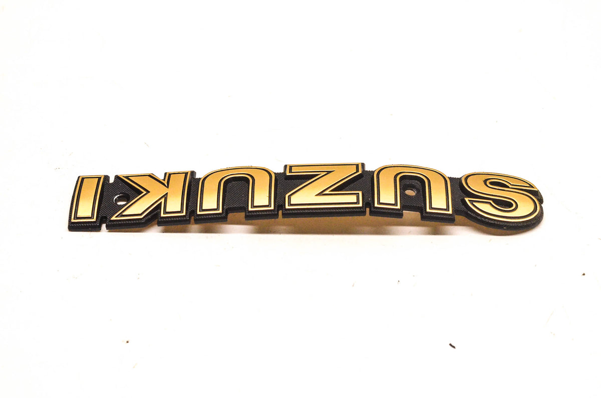 New OEM Suzuki 68111-37300 Fuel Tank Emblem NOS