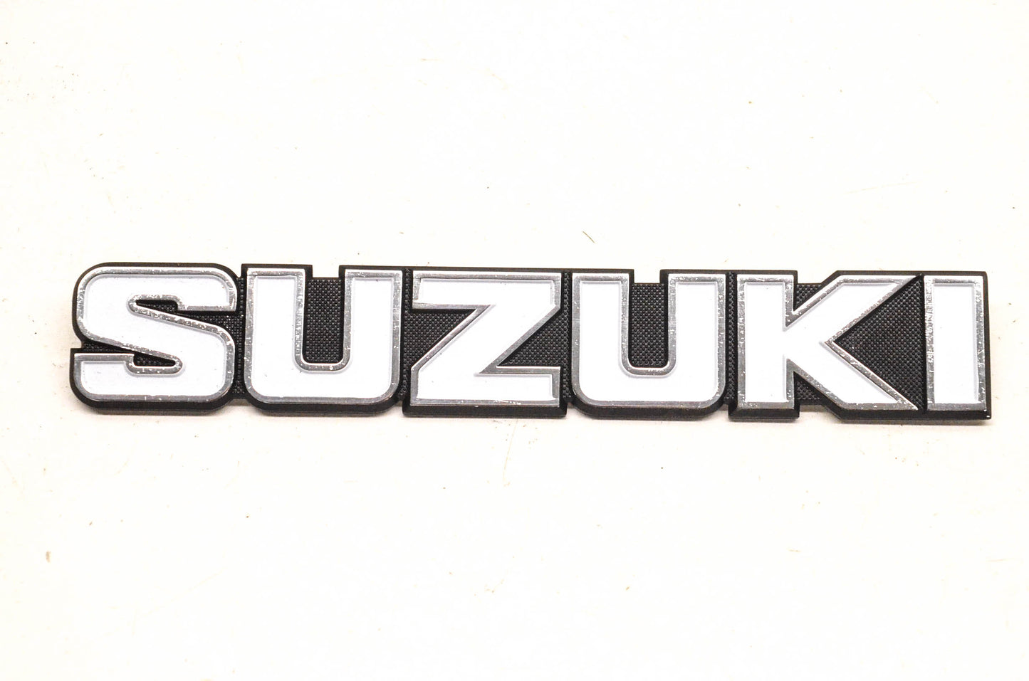 New OEM Suzuki White and Black Emblem NOS