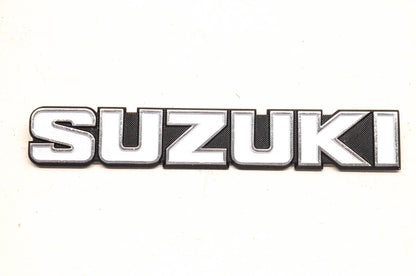 New OEM Suzuki White and Black Emblem NOS