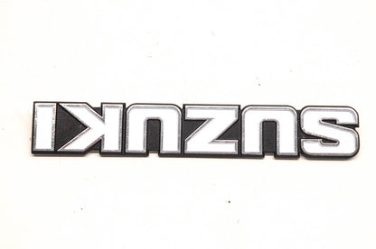 New OEM Suzuki White and Black Emblem NOS