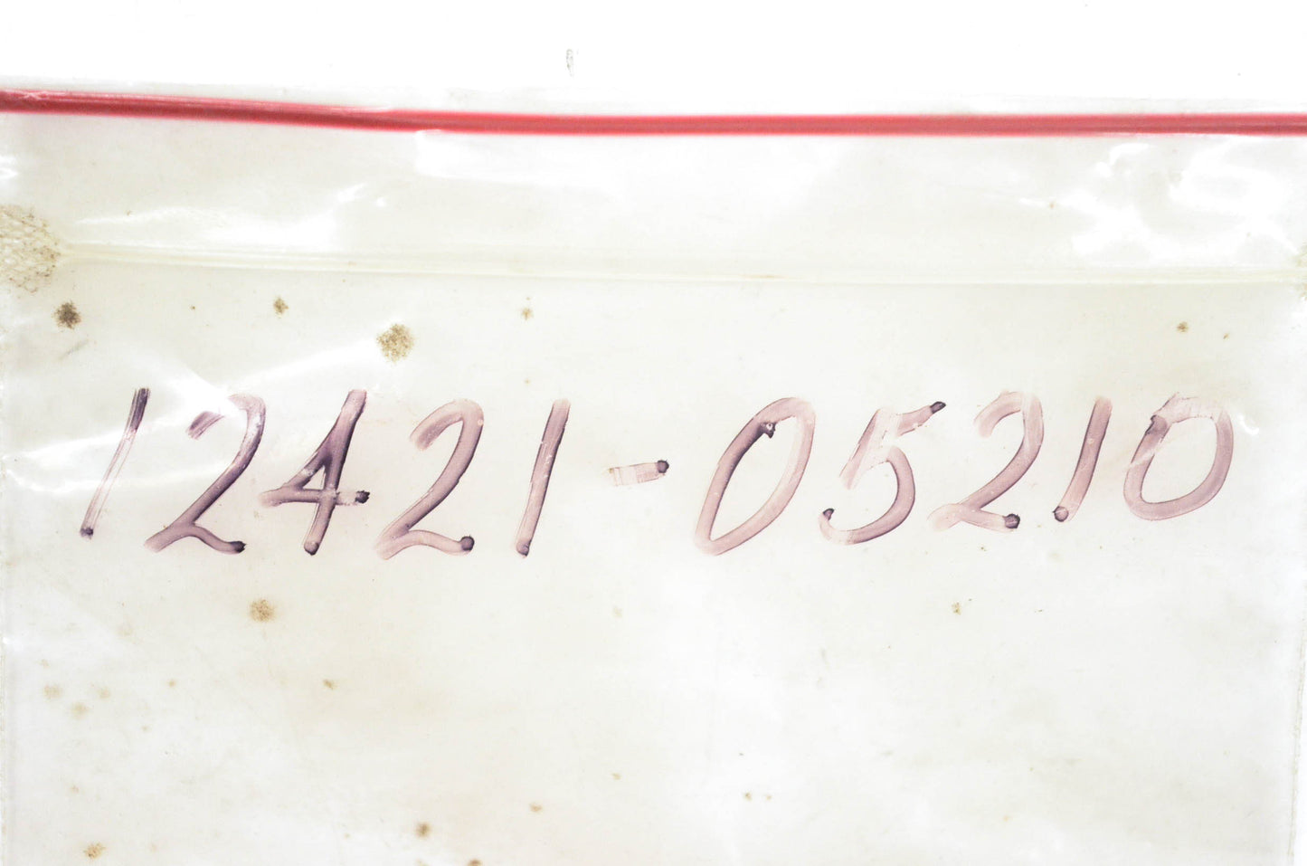 New OEM Suzuki 12421-05210 Disk Valve Guide NOS