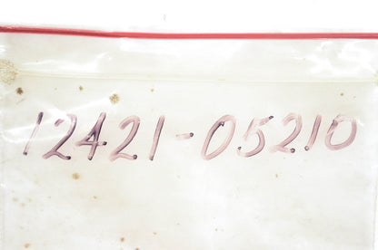 New OEM Suzuki 12421-05210 Disk Valve Guide NOS