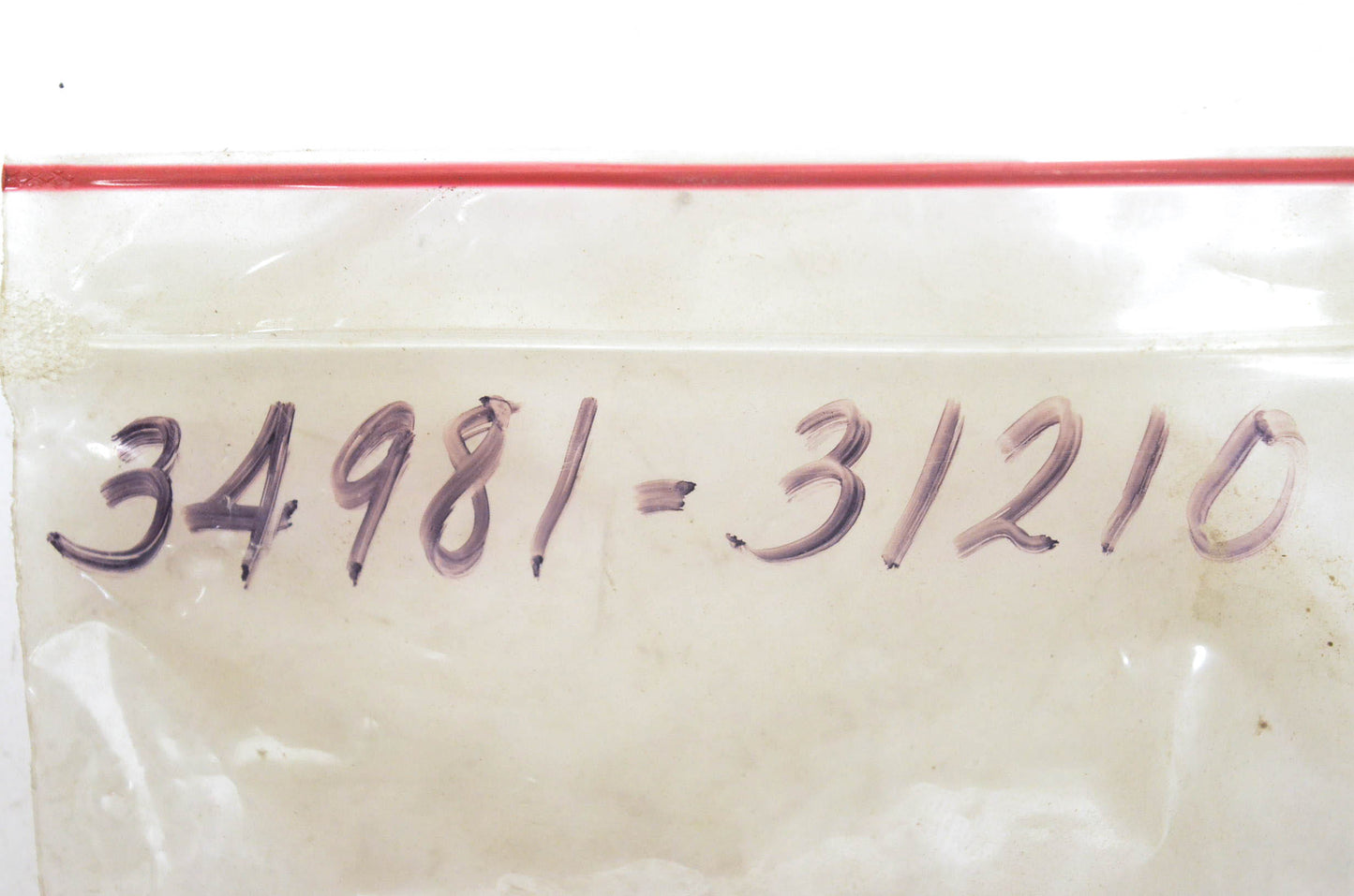 New OEM Suzuki 34981-31210 Pilot Bulb Case Plate NOS