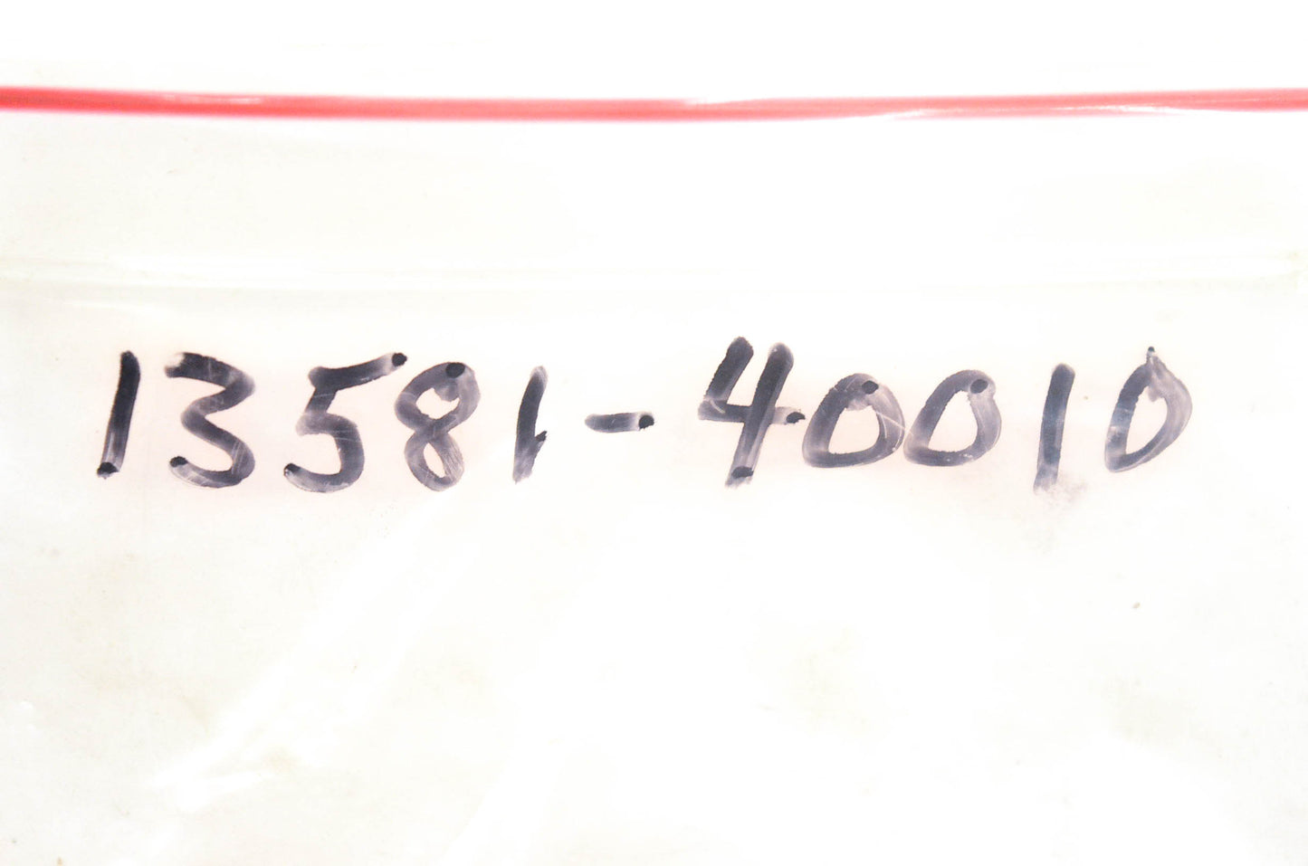 New OEM Suzuki 13581-40010 Carburetor Spring Plate NOS