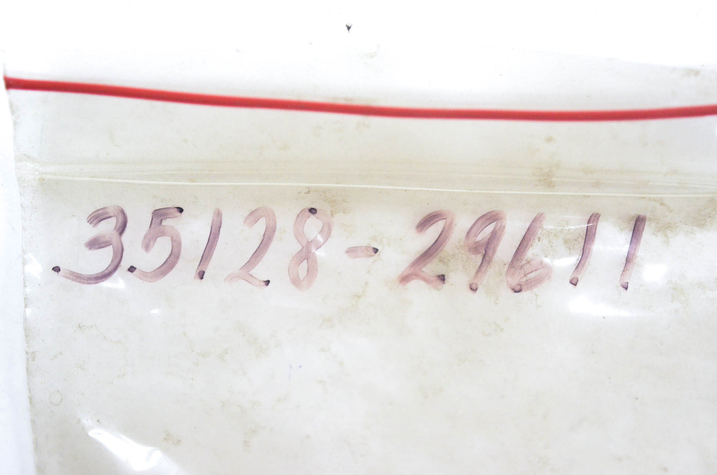 New OEM Suzuki 35128-29611 Head Light Spring NOS