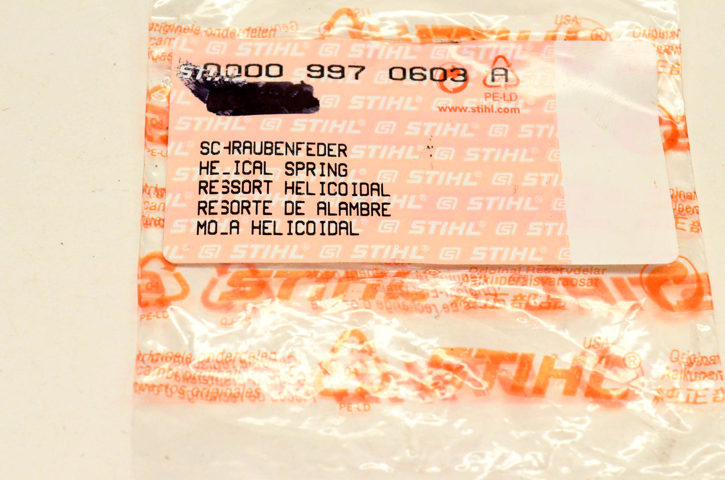 New OEM Stihl 0000-997-0603 , 0000 997 0603 A Throttle Lock Spring NOS