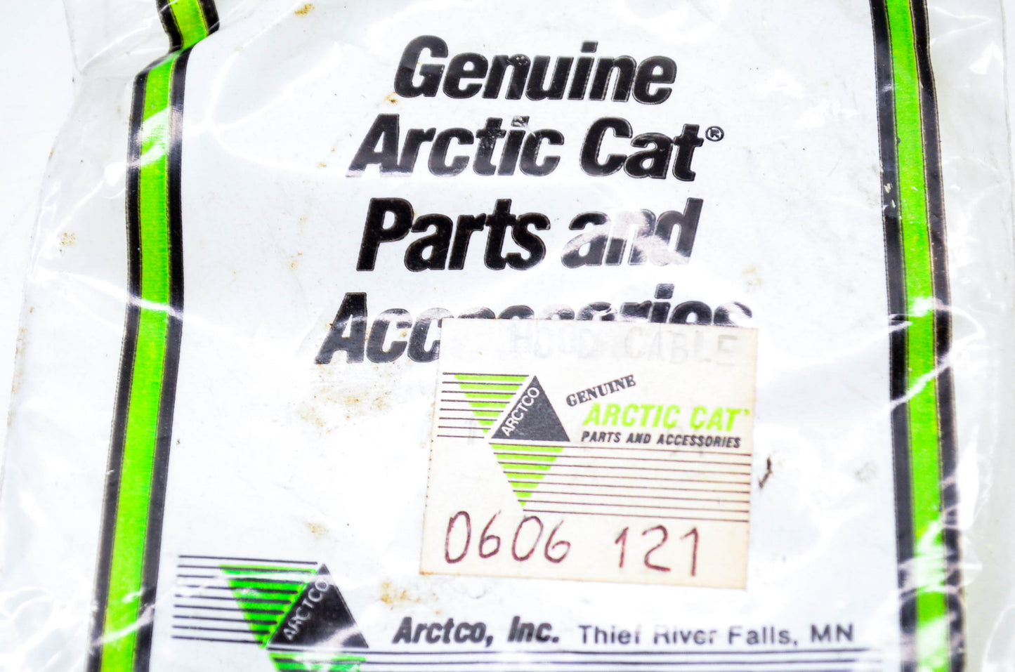 New OEM Arctic Cat 0606-121 Hood Cable NOS