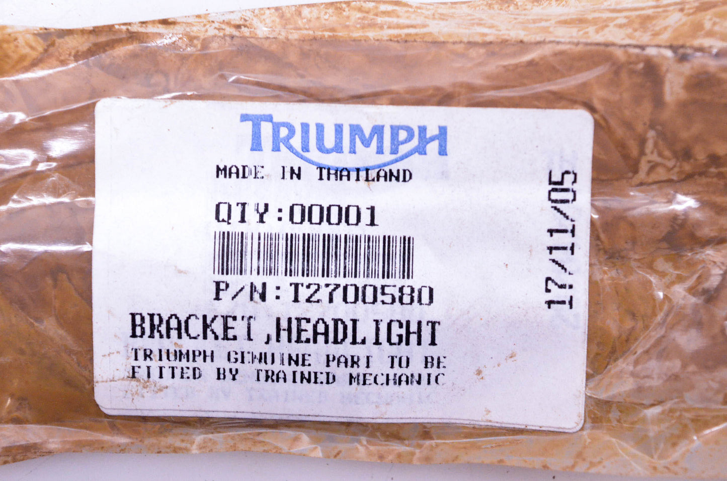New OEM Triumph T2700580 Headlight Bracket NOS
