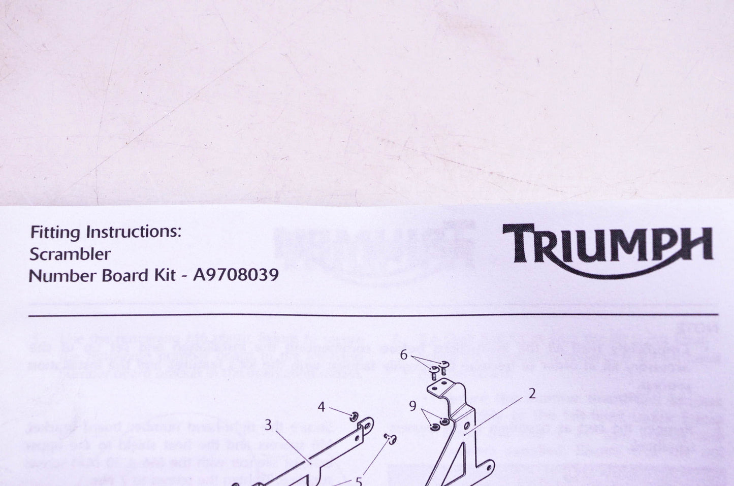 New OEM Triumph A9708039 Number Board Kit NOS