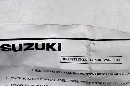 New OEM Suzuki 99950-70134 DR Instrument Guard NOS