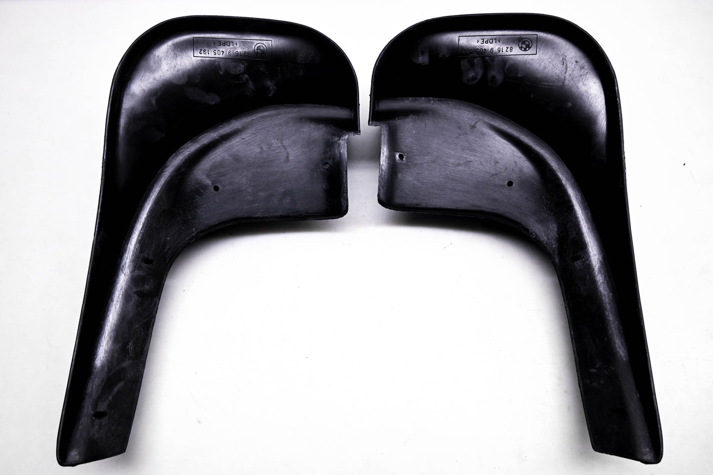 New OEM BMW 82169405192 Mudflap Kit NOS