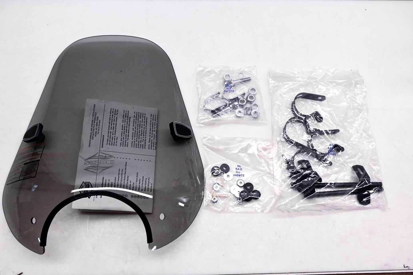 New OEM Suzuki 99950-72000 Intruder Tinted Windshield Kit NOS