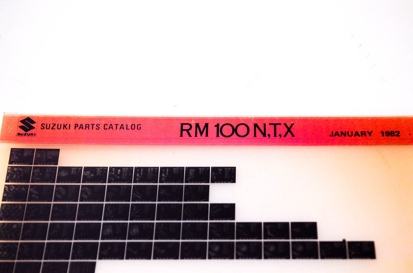 OEM Suzuki RM100 N,T,X 1982/January Suzuki Parts Catalog RM100 N,T,X Microfiche