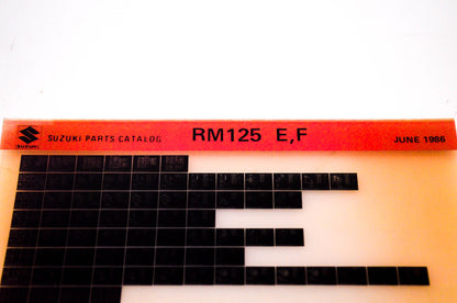OEM Suzuki RM125 E,F 1986/June Suzuki Parts Catalog RM125 E,F Microfiche