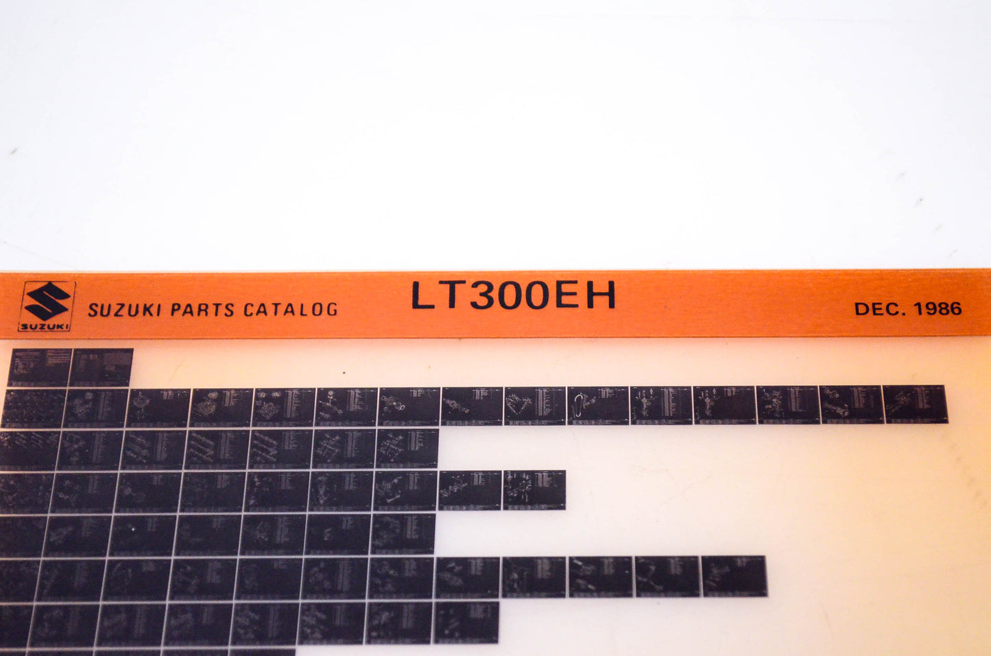 OEM Suzuki LT300EH 1986/December Parts Catalog Microfiche