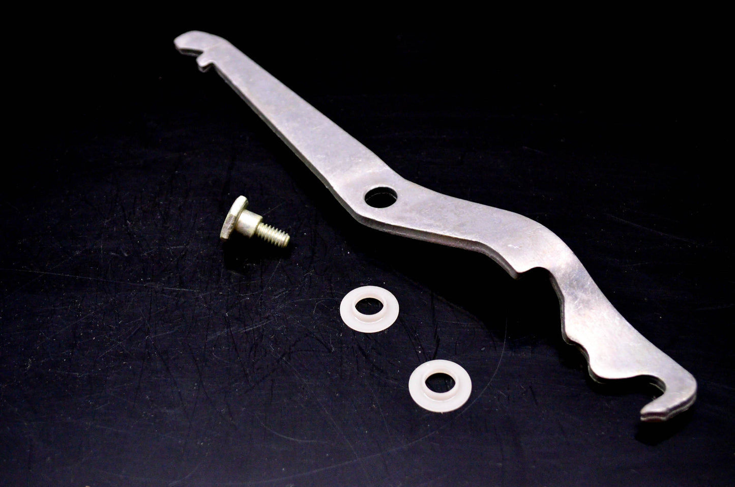 OMC 384767 Shifter Lock Arm Assembly NOS