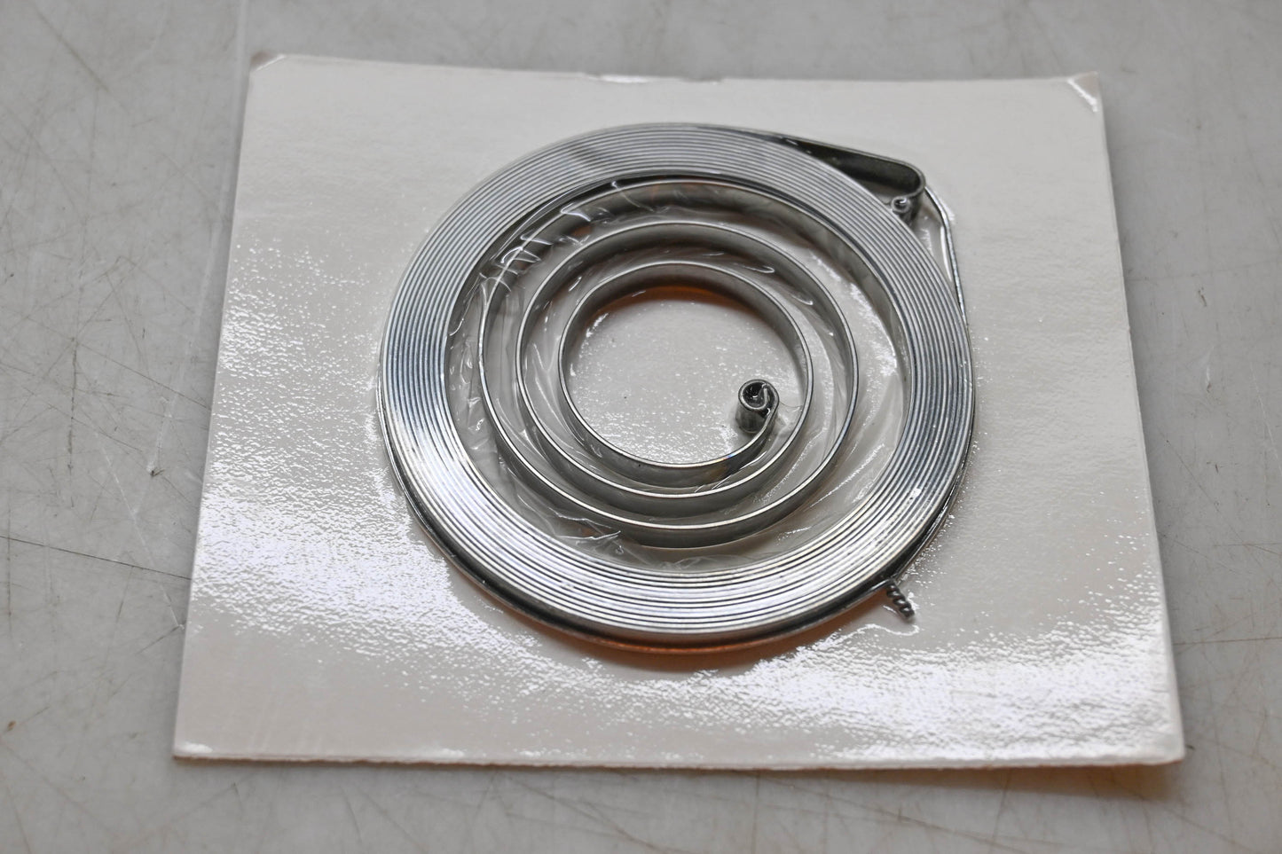 New OEM Husqvarna 501 52 04-02, 501520402 Recoil Spring NOS