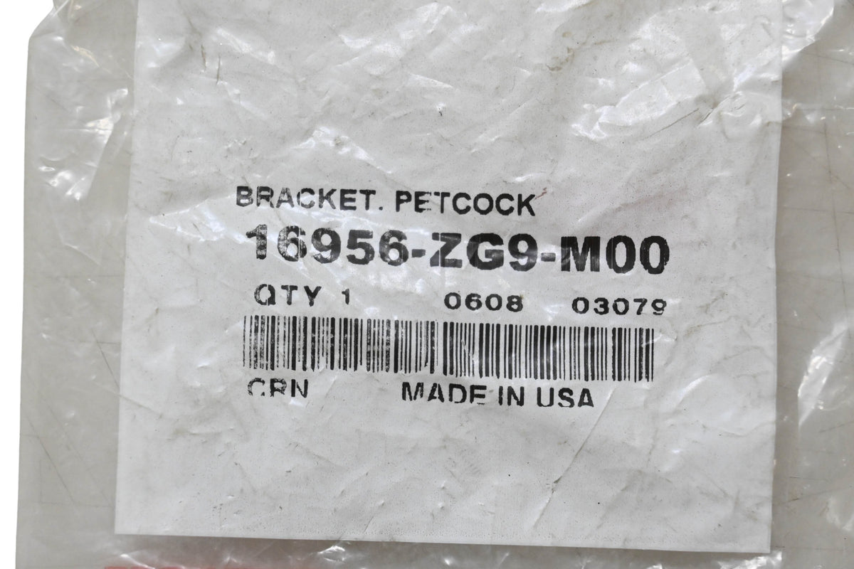 New OEM Honda 16956-ZG9-M00 Petcock Bracket NOS