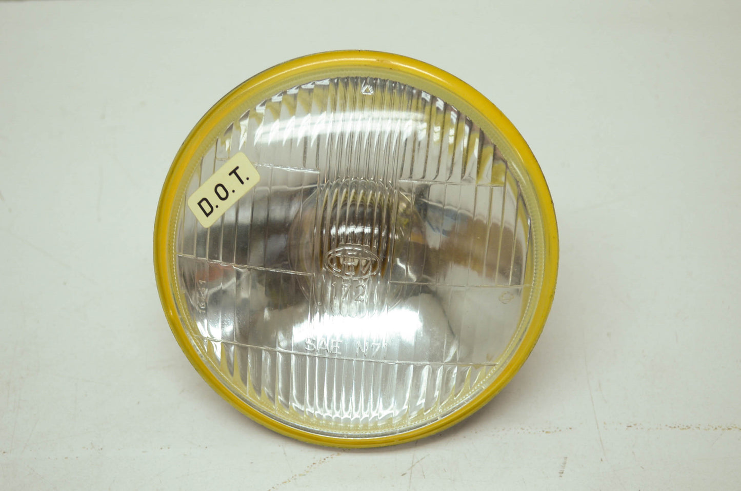 NEW OEM Harley Aermacchi Headlight 73-75 X90 67717-73P NOS