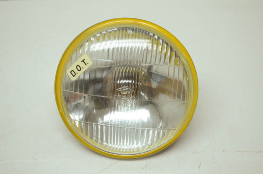 NEW OEM Harley Aermacchi Headlight 73-75 X90 67717-73P NOS