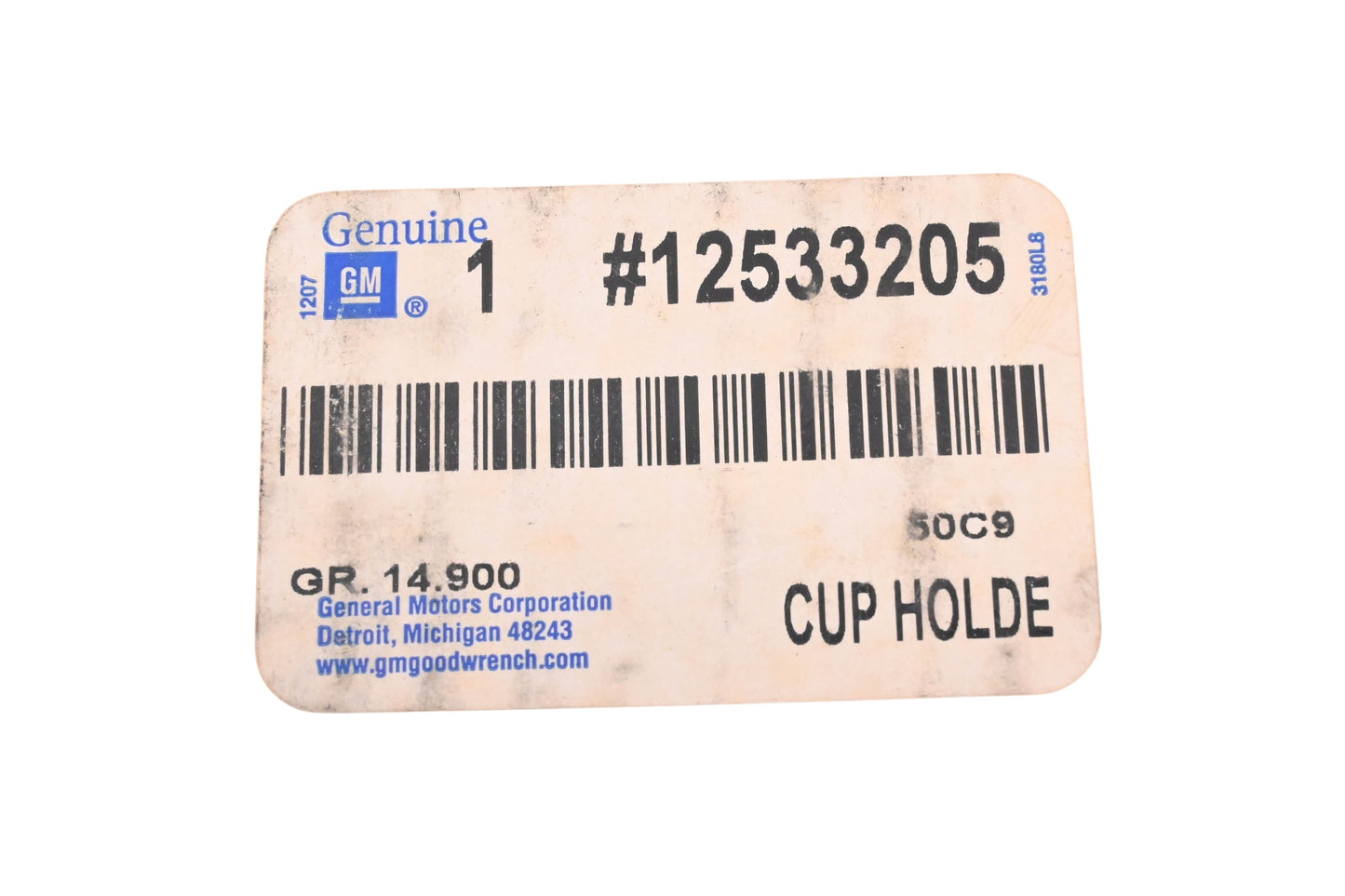 General Motors 12533205 Front Armrest Cupholder Assembly NOS