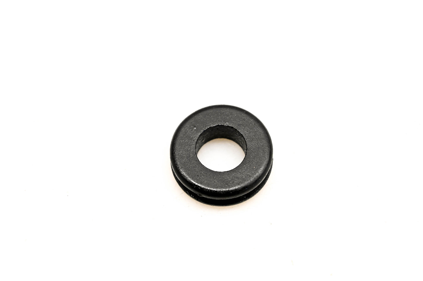 Mack 87AX7, 25098469 Grommet NOS